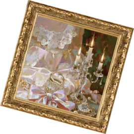 pearls and pink fabrics in a gold picture frame