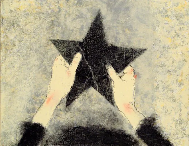 person holding a star