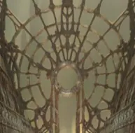 a small, square picture of an unreasonably soomed in cathedral-type walls