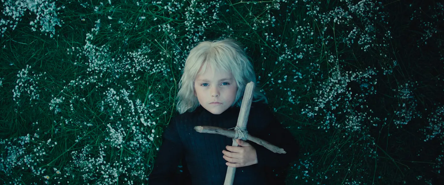 young boy with sword