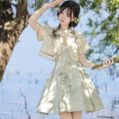 A young girl with a pale green dress